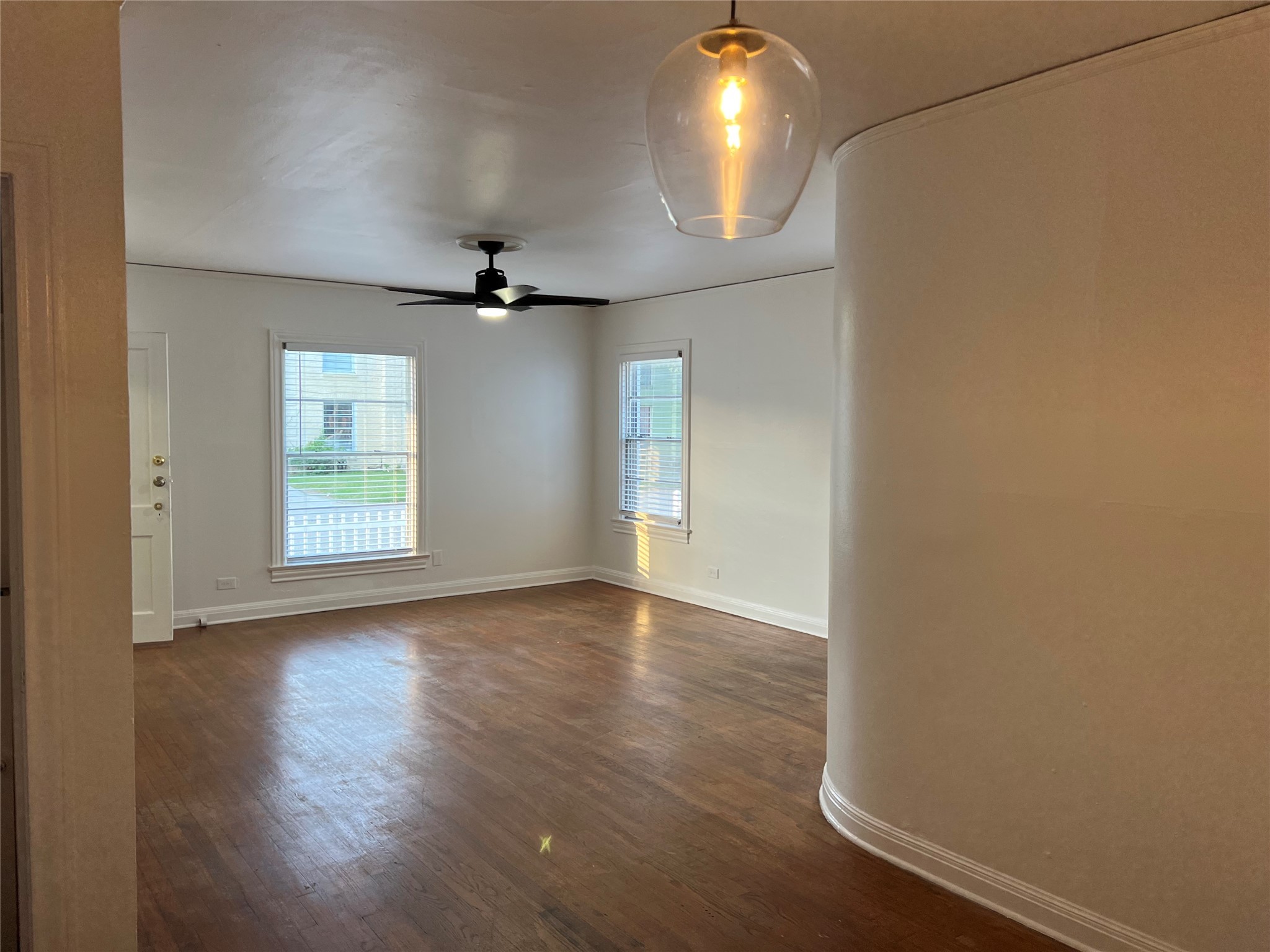 1853 West Main Street, Unit 2 Houston, TX 77098 - Photo 3 of 16 wooden floor in an empty room with a window