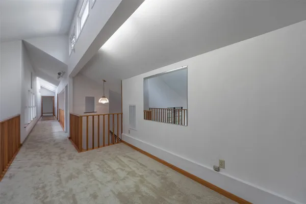 a view of a hallway with entryway