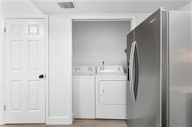 a utility room with dryer and washer