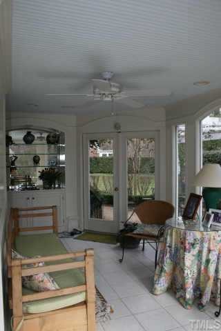 2614 Cooleemee Drive Raleigh, NC 27608 - Photo 2 of 12 a living room with furniture and a large window