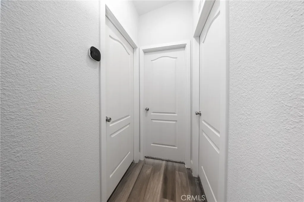 1855 East Riverside Drive, Unit 252 Ontario, CA 91761 - Photo 18 of 32 a view of a hallway