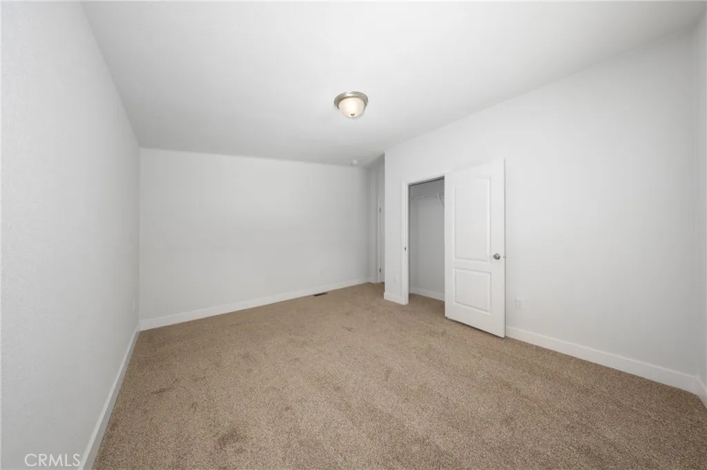 1855 East Riverside Drive, Unit 252 Ontario, CA 91761 - Photo 19 of 32 a view of an empty room