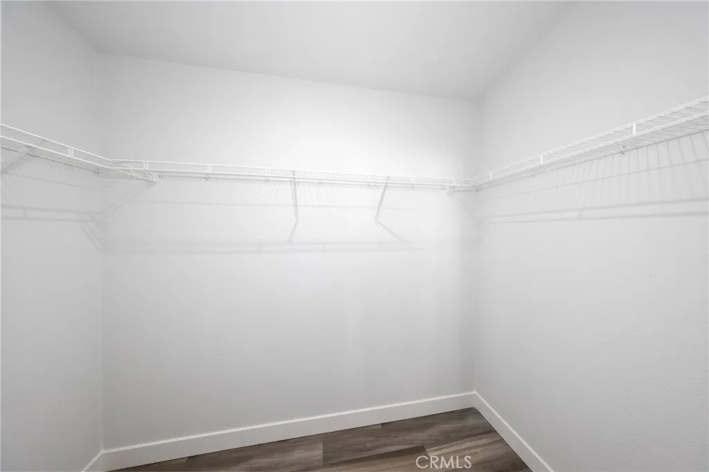 1855 East Riverside Drive, Unit 252 Ontario, CA 91761 - Photo 20 of 32 a view of an empty walk in closet