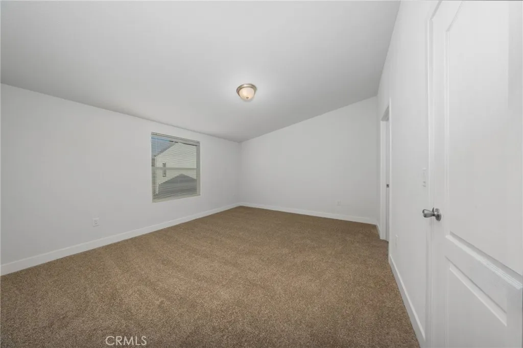 1855 East Riverside Drive, Unit 252 Ontario, CA 91761 - Photo 22 of 32 a view of an empty room