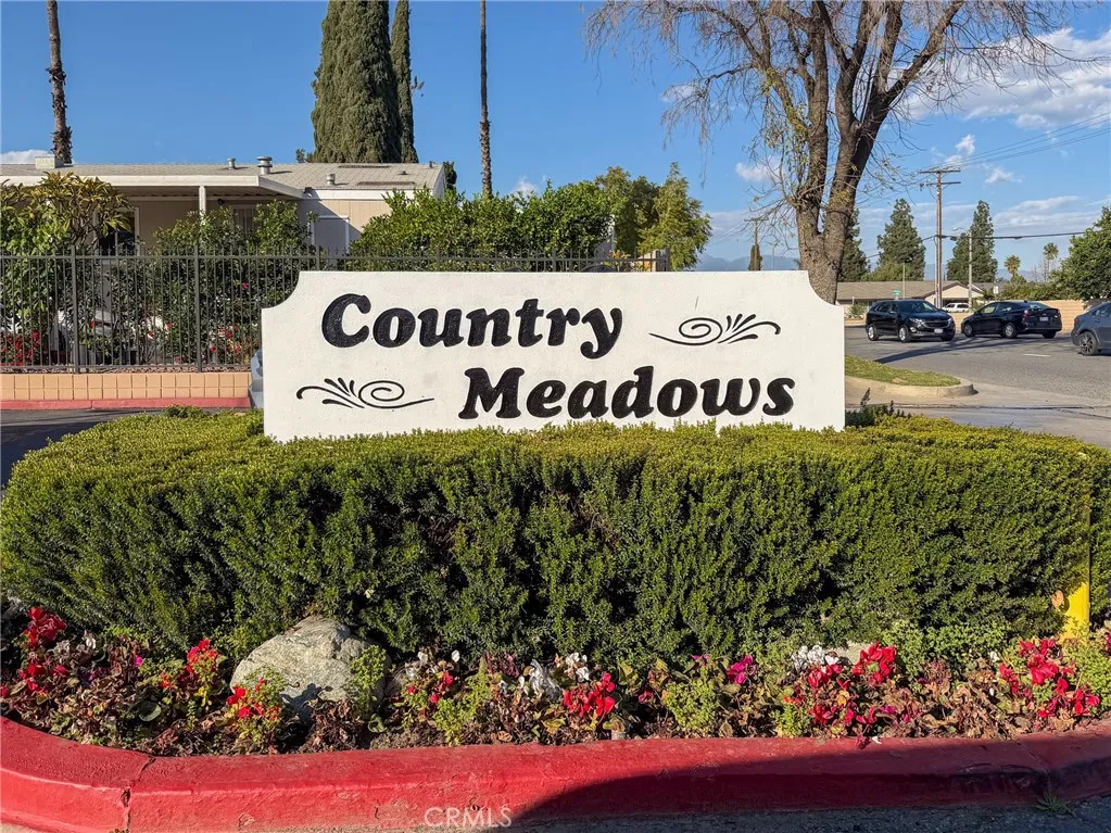 1855 East Riverside Drive, Unit 252 Ontario, CA 91761 - Photo 30 of 32 a sign on the side of the road