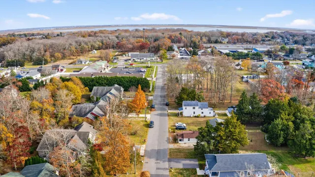 an aerial view of residential building and parking space