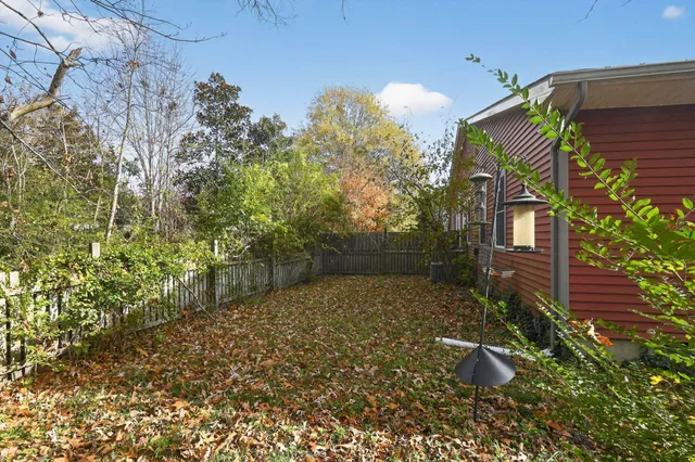 a backyard of a house with lots of green space