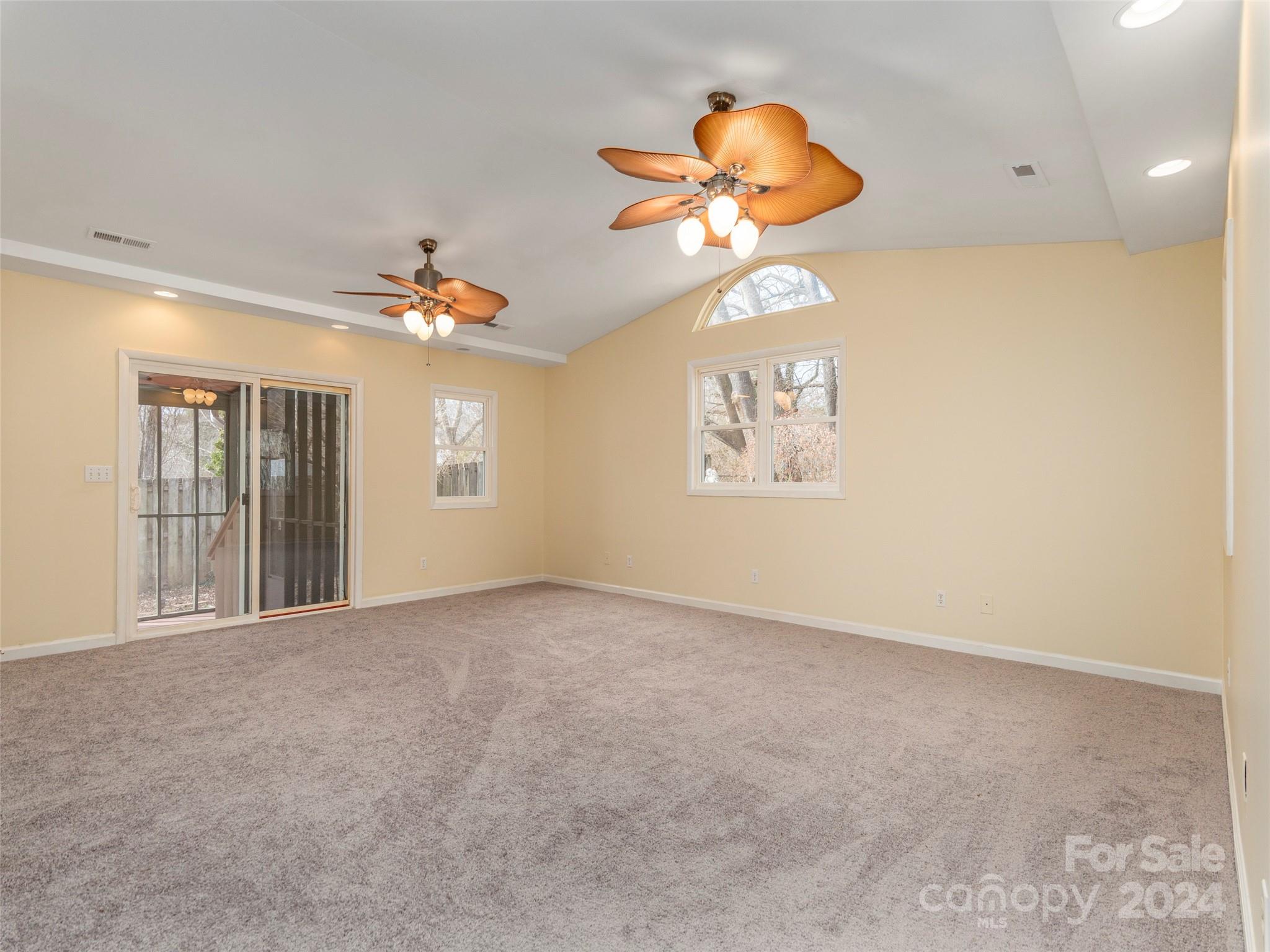 40 Wagon Road Asheville, NC 28805 - Photo 12 of 29 a view of an empty room with a chandelier fan