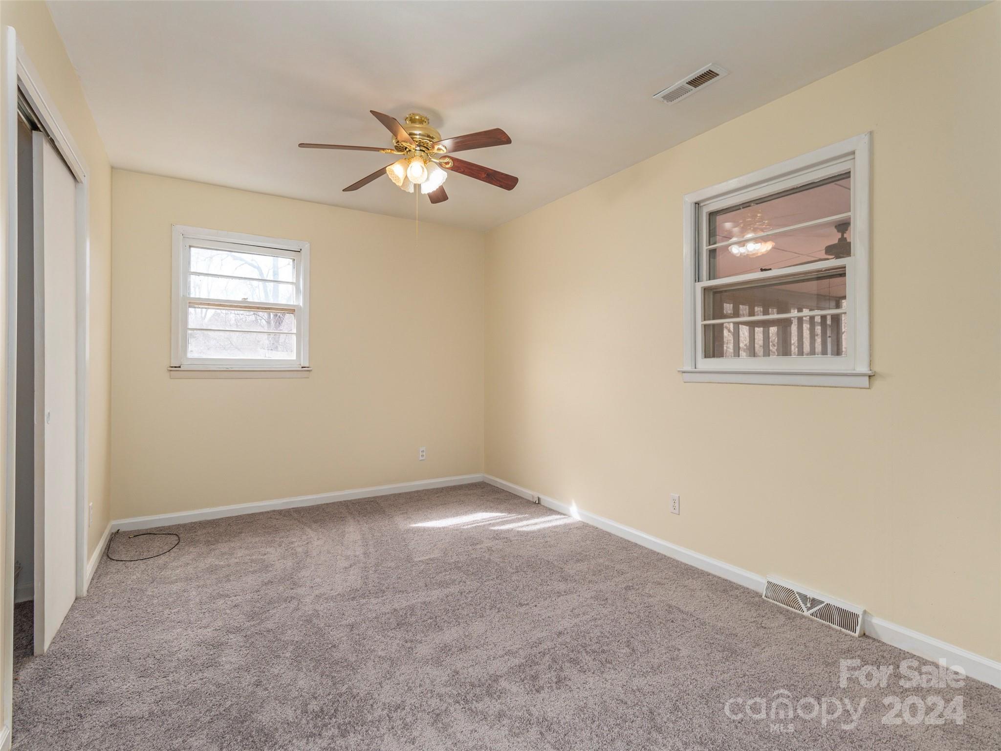 40 Wagon Road Asheville, NC 28805 - Photo 15 of 29 a view of an empty room with a window