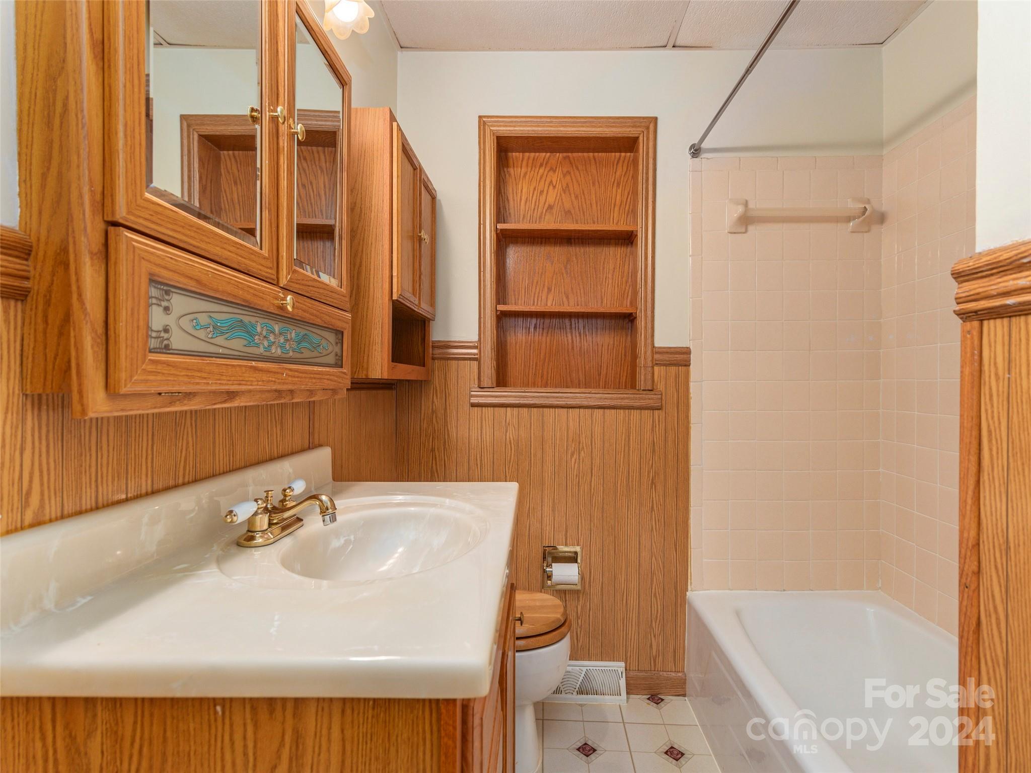 40 Wagon Road Asheville, NC 28805 - Photo 20 of 29 a bathroom with a sink and a bathtub