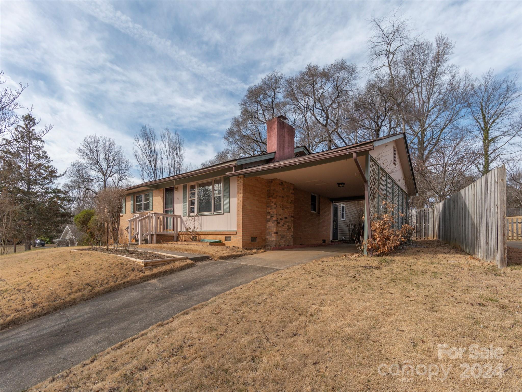 40 Wagon Road Asheville, NC 28805 - Photo 2 of 29 a view of a house with a snow in front of yard