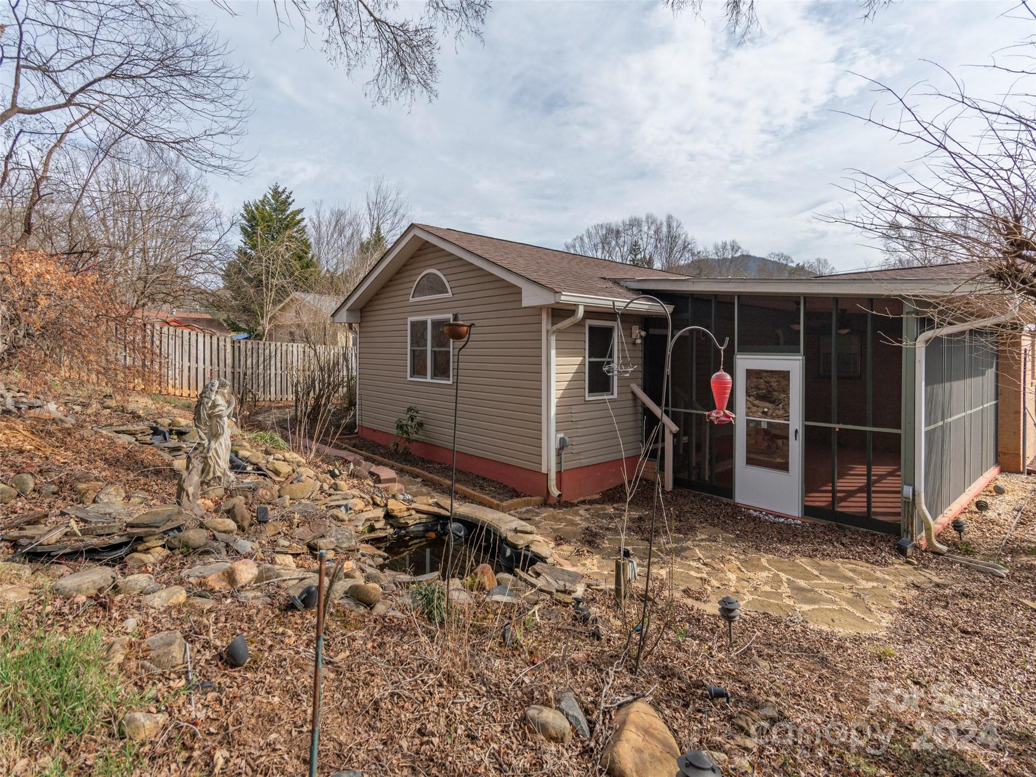 40 Wagon Road Asheville, NC 28805 - Photo 24 of 29 a view of a house with a yard