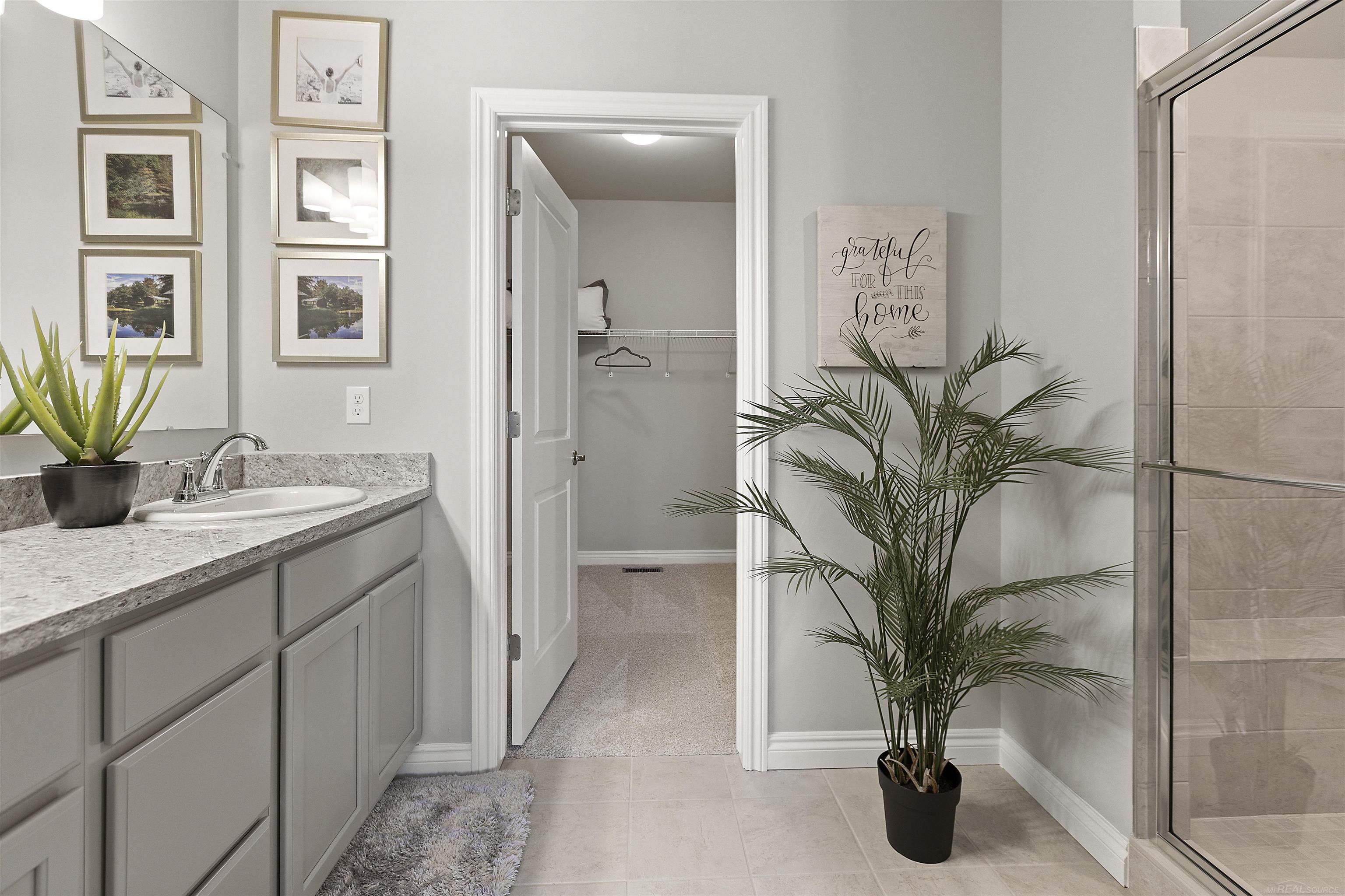 9905 Crossover Trail Howell, MI 48855 - Photo 15 of 19 Owner's Bath