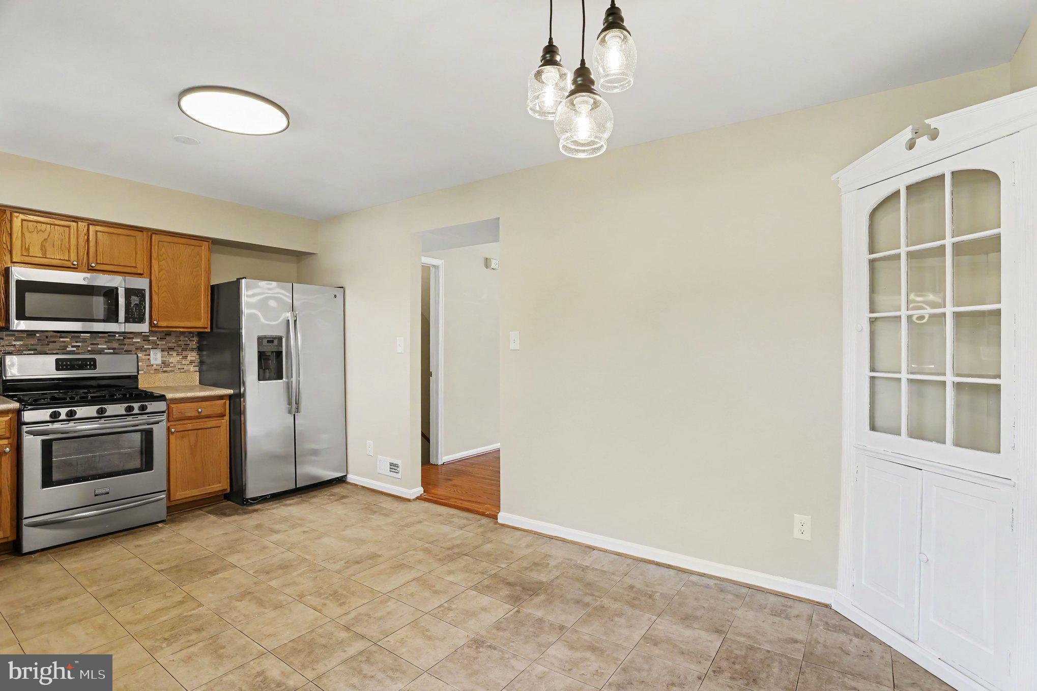 32 Tameron Place Rosedale, MD 21237 - Photo 12 of 39 Very spacious dining room and kitchen