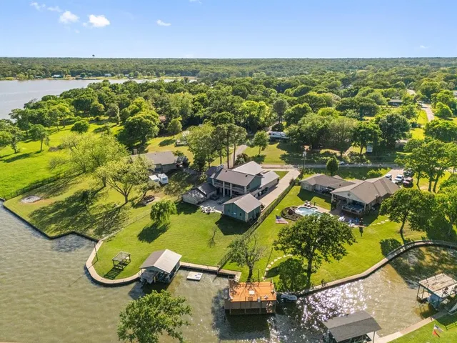 an aerial view of a house with a garden