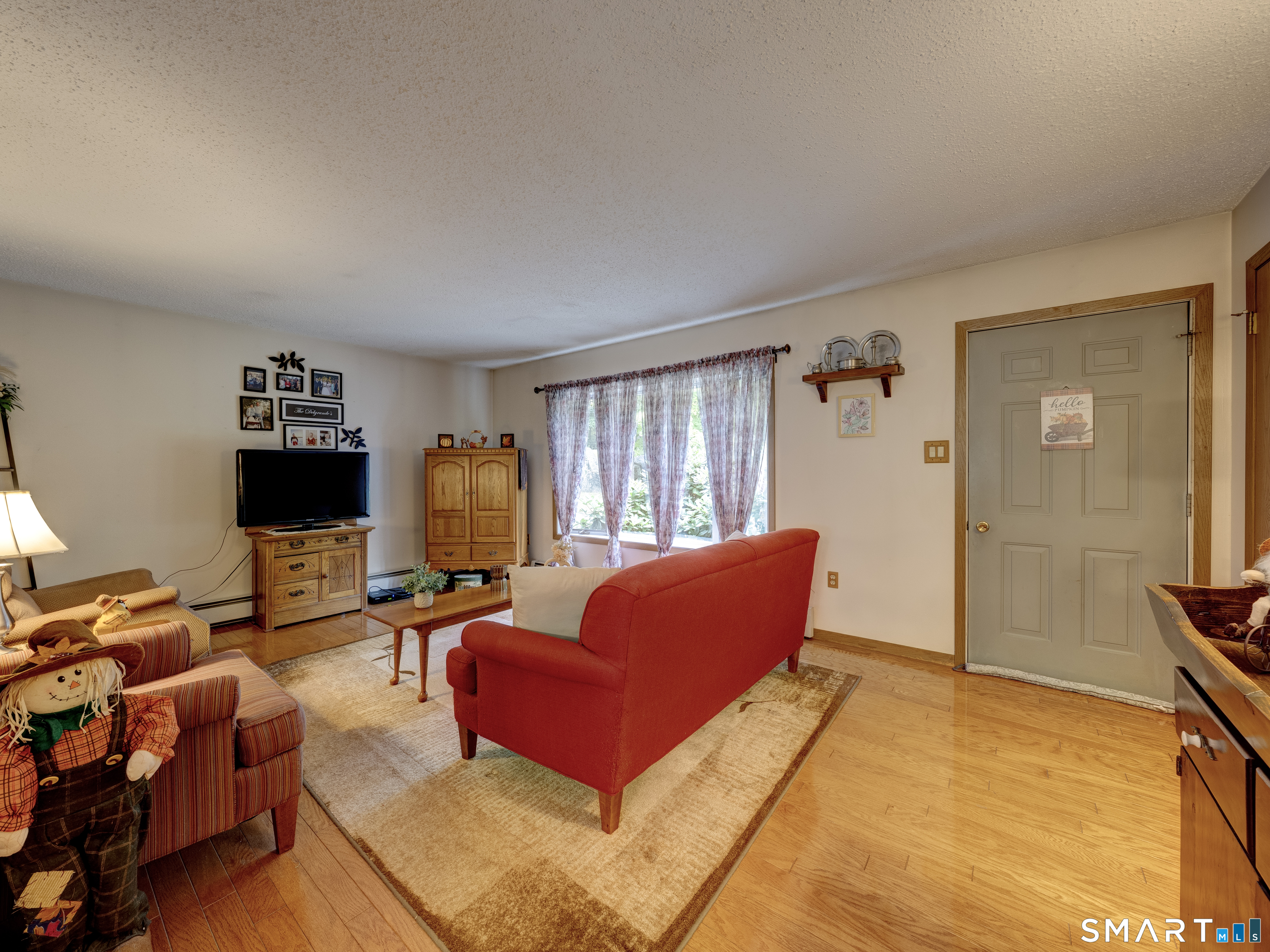 83 Old Mt Tom Road Litchfield, CT 06750 - Photo 3 of 33 Living room with hardwood floors