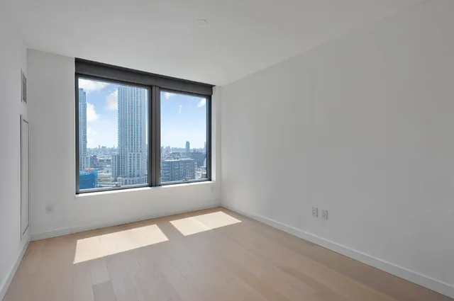 a kitchen with a sink and a stove top oven