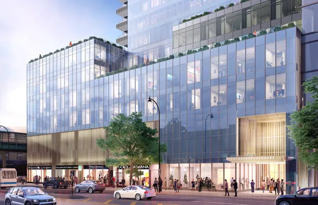 a front view of a building with a street