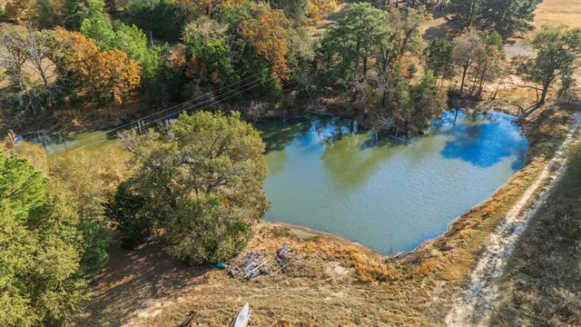 a view of swimming pool with an outdoor space and seating area