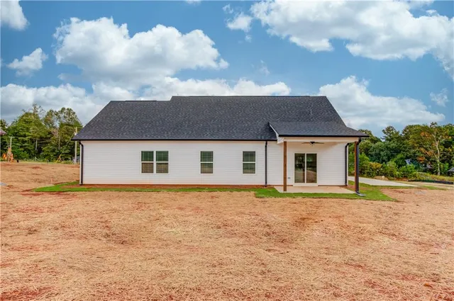 view of a house with a yard