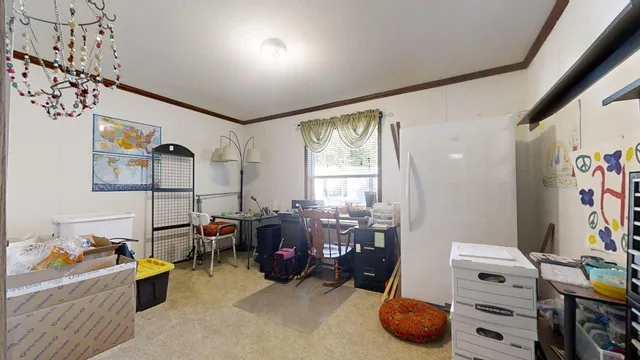 a view of a livingroom with furniture