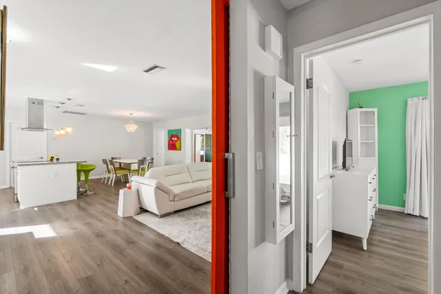 a bathroom with a granite countertop shower