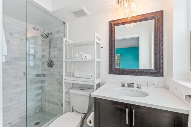 a view of a room with wooden floor closet and a window