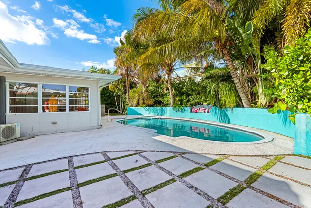 an aerial view of a city and lake view