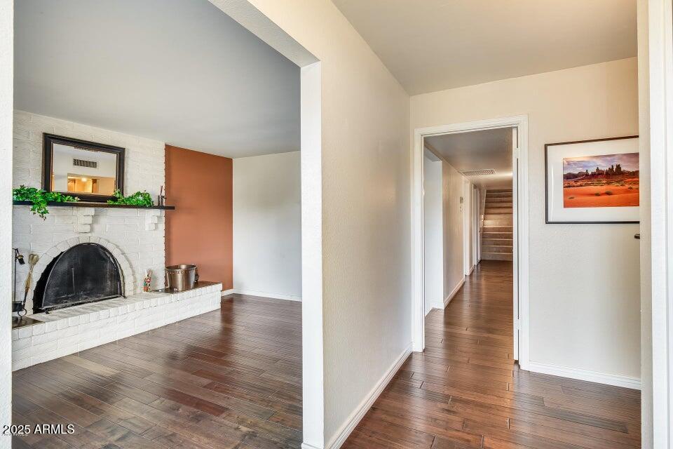 3527 West Yucca Street Phoenix, AZ 85029 - Photo 4 of 20 a view of a livingroom with furniture and a fireplace