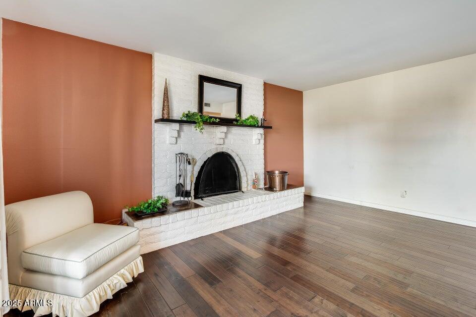 3527 West Yucca Street Phoenix, AZ 85029 - Photo 5 of 20 a living room with furniture and a fireplace