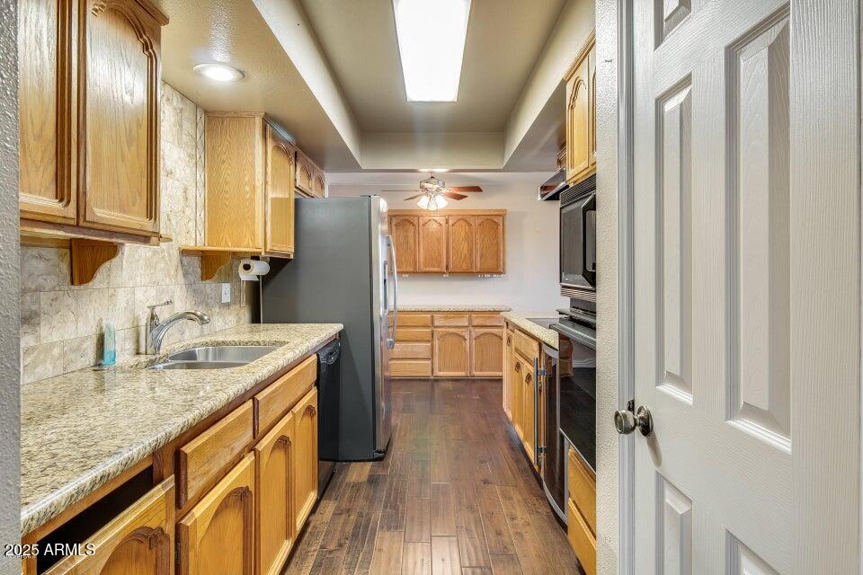 3527 West Yucca Street Phoenix, AZ 85029 - Photo 10 of 20 a bathroom with a granite countertop sink a washer and dryer