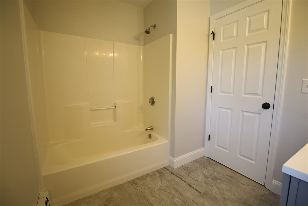 110 St Louis Street Worcester, MA 01607 - Photo 19 of 34 a bathroom with a bathtub