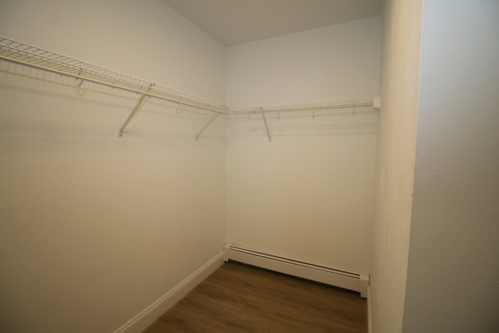 110 St Louis Street Worcester, MA 01607 - Photo 23 of 34 a view of a room with racks on the wall