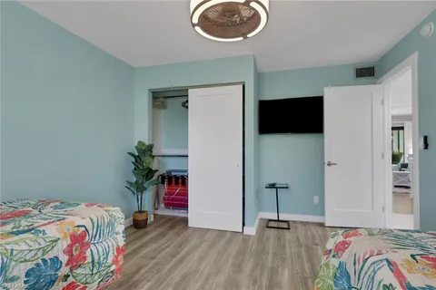 a view of a hallway with washer and dryer