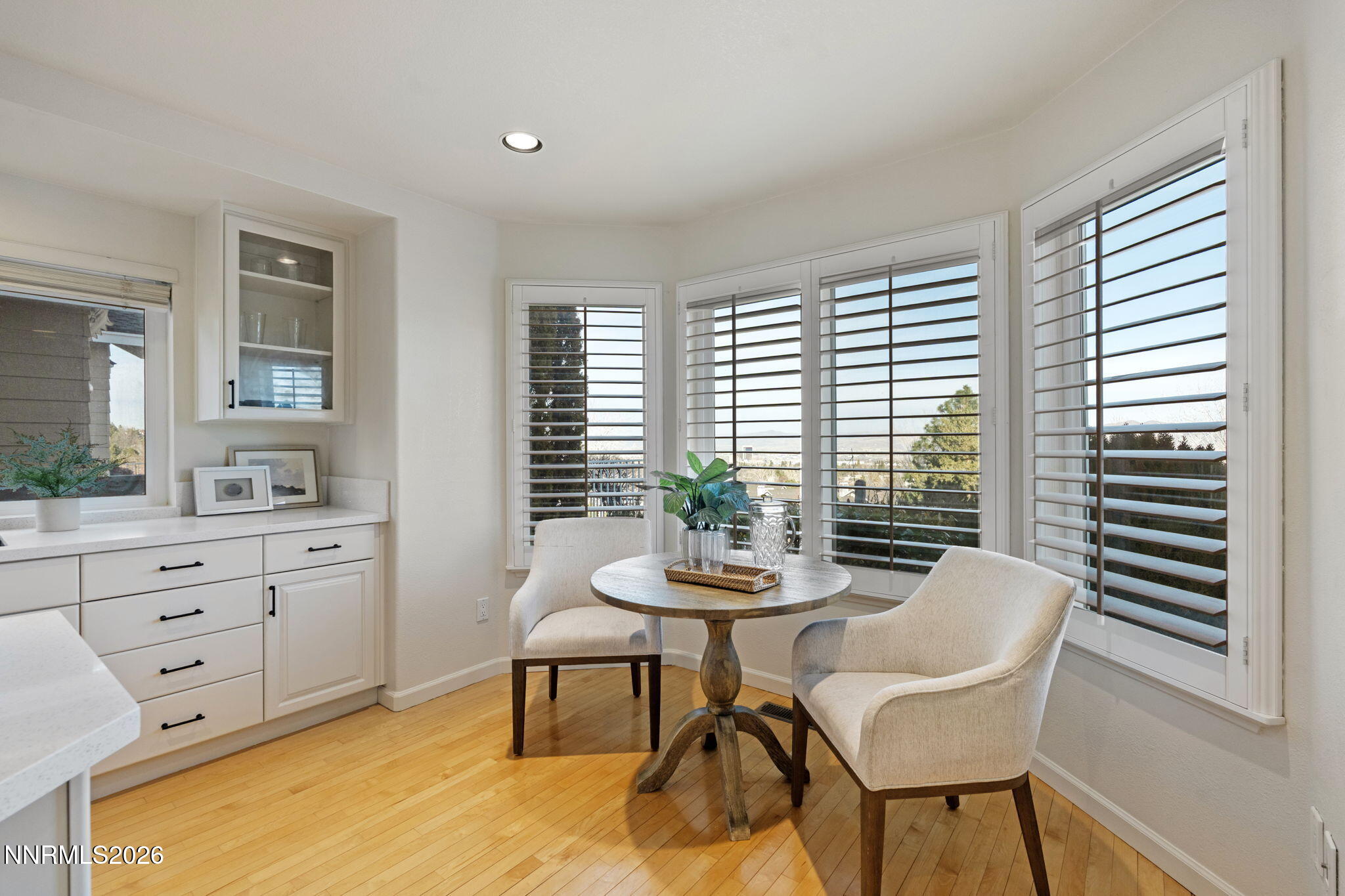 6186 Squires Lane Reno, NV 89519 - Photo 16 of 57 a view of a dining room with furniture and window