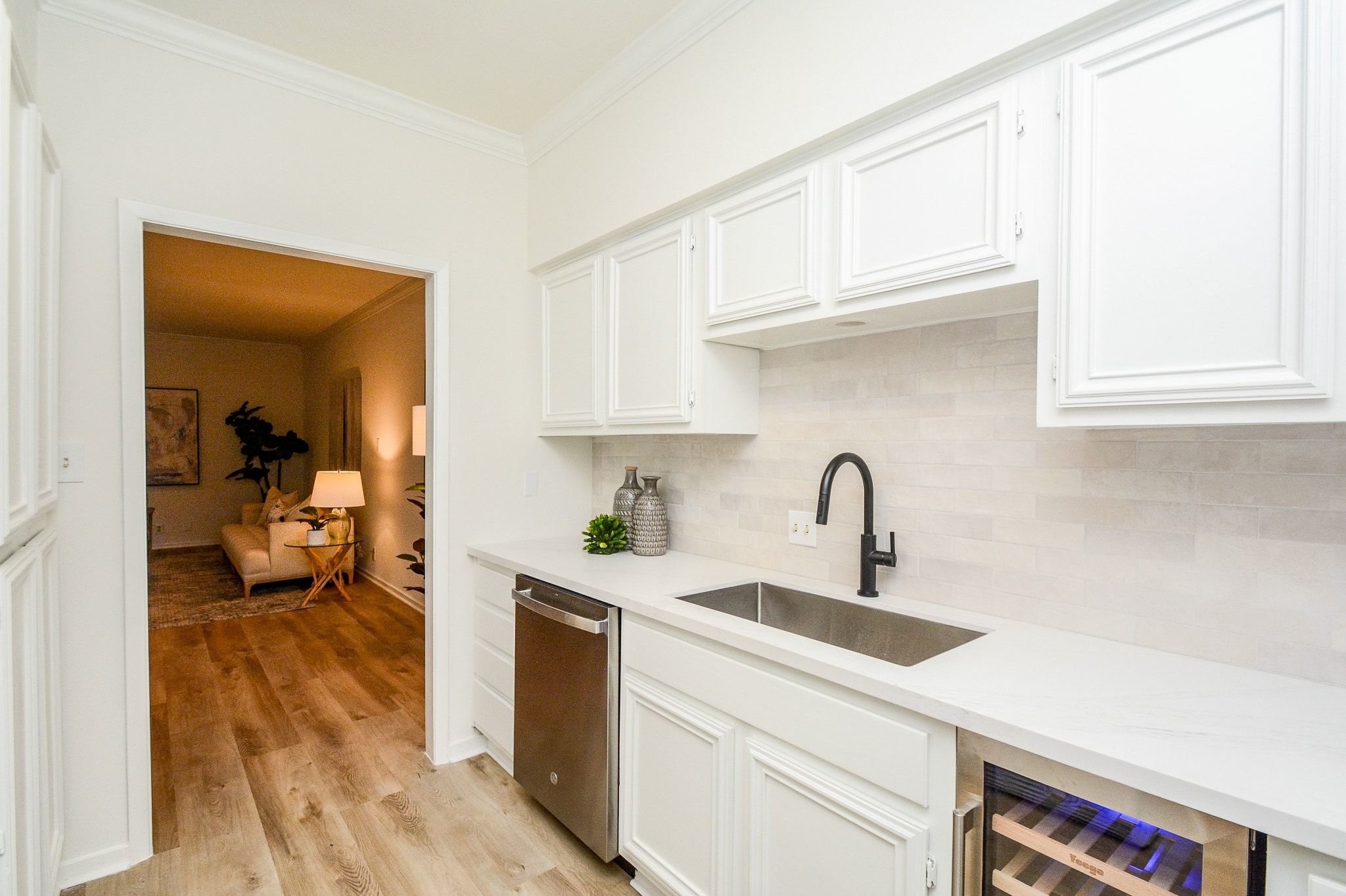 820 Harold Street Houston, TX 77006 - Photo 7 of 33 The kitchen connects seamlessly to the dining and living areas, with a pantry cabinet and plenty of counter space to work with.