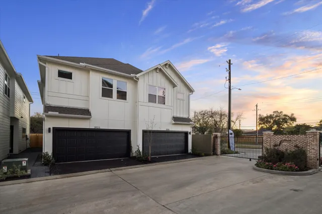 a house view with a garden space