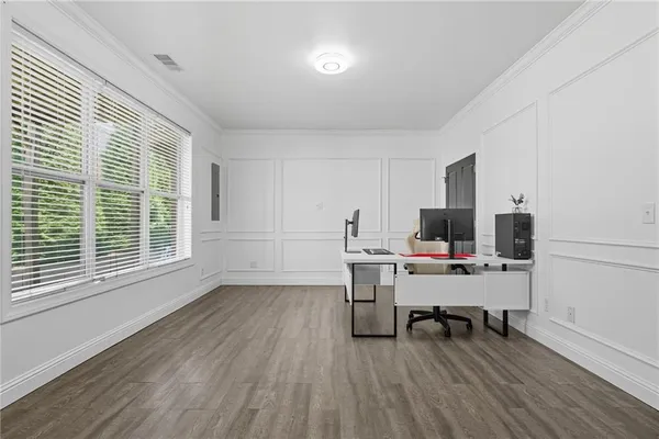 a workspace with wooden floor