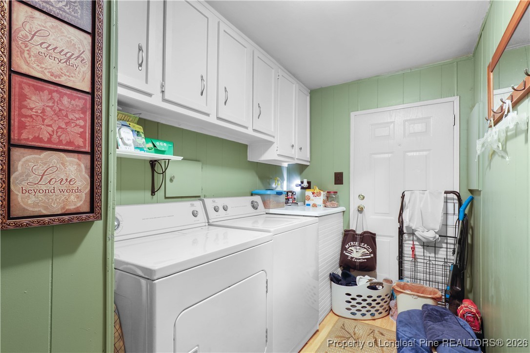 156 Connell Road Carthage, NC 28327 - Photo 23 of 43 a utility room with fridge and washer