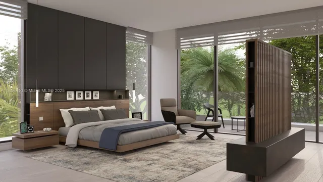 a bedroom with a bed and large glass windows