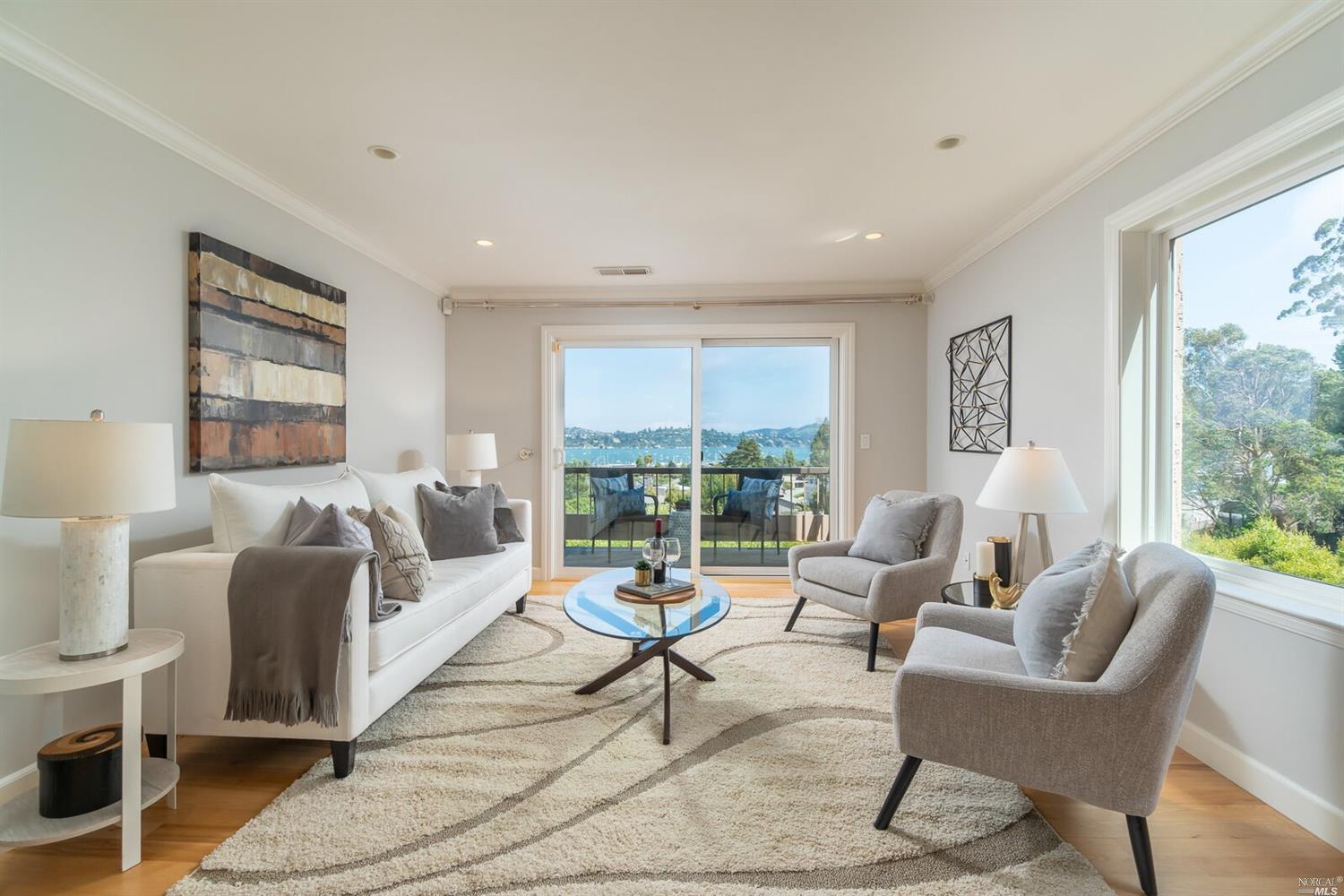 53 Anchorage Road Sausalito, CA 94965 - Photo 1 of 1 a living room with furniture and a large window