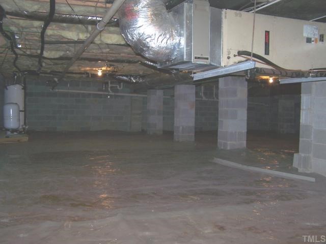 448 Lewis Road Clarksville, VA 23927 - Photo 11 of 12 Technically crawl space, it is almost stand-up height. Look at how clean and like new. The moisture barrier as well as insulation is totally intact adding to the energy efficiency of the home.