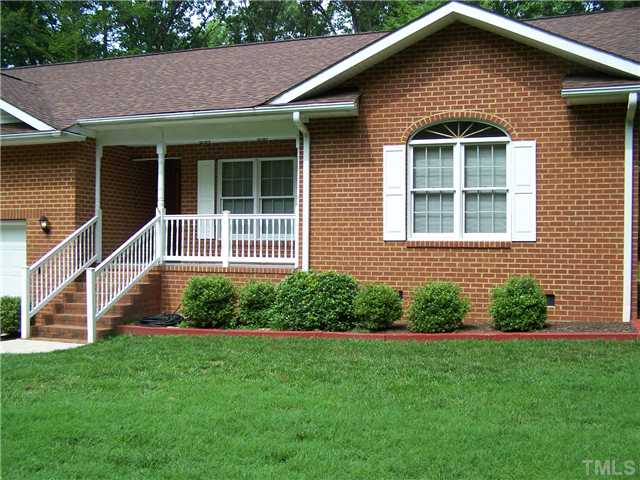 448 Lewis Road Clarksville, VA 23927 - Photo 2 of 12 Another view of the front of the house closer to the front entrance and porch.
