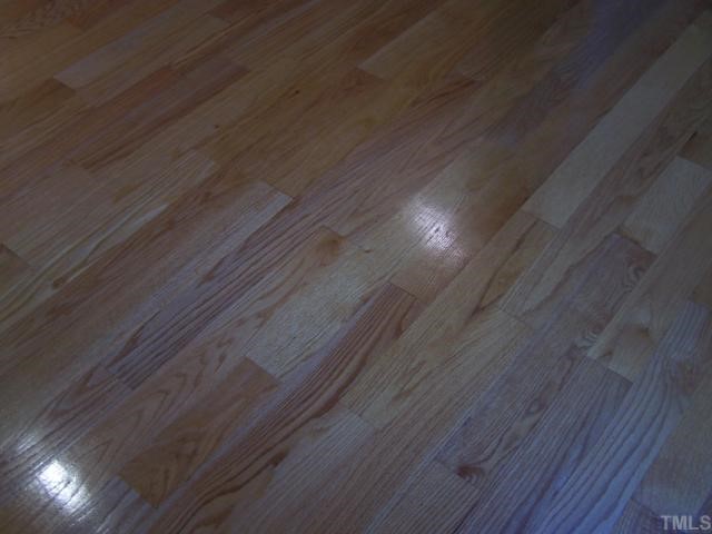 448 Lewis Road Clarksville, VA 23927 - Photo 5 of 12 Four inch Red Oak hardwood floors are throughout the living area and hallways. There is new ceramic tile flooring in the kitchen.