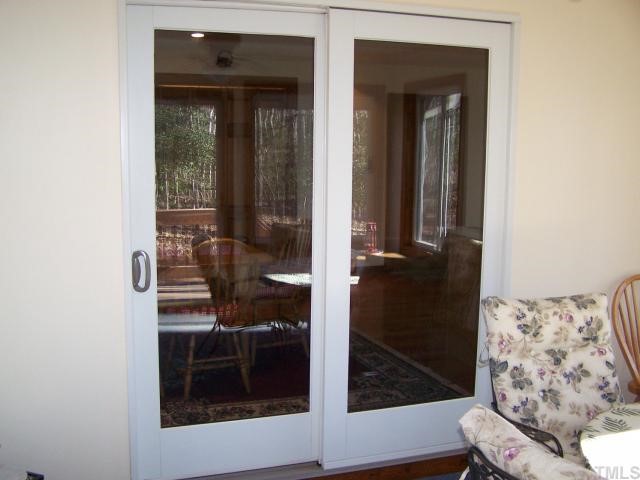 448 Lewis Road Clarksville, VA 23927 - Photo 7 of 12 This picture is of the Andersen doors leading from the Sunroom back into the house. Andersen Windows were used throughout the sunroom and the rest of the house for high energy efficiency.