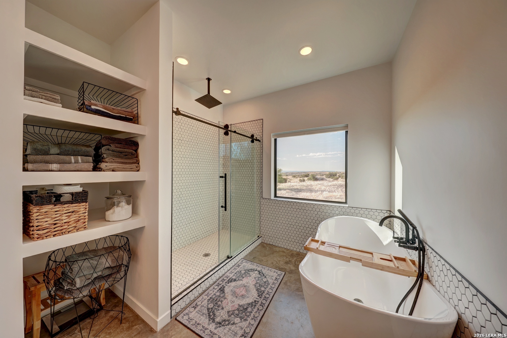 28 Scenic Ridge Road South Alpine, TX 79830 - Photo 16 of 48 a bathroom with a tub toilet and shower