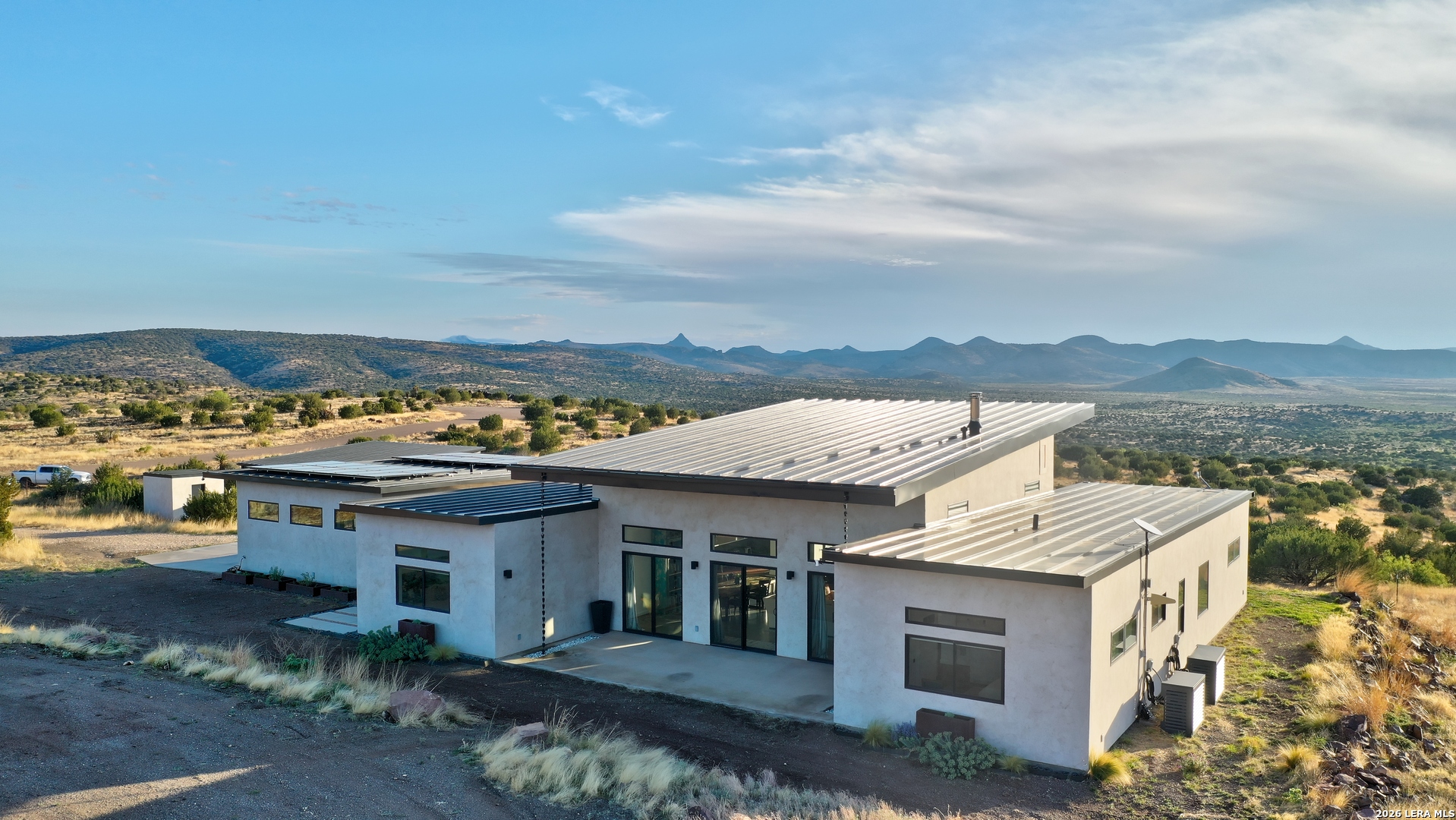 28 Scenic Ridge Road South Alpine, TX 79830 - Photo 2 of 48 an aerial view of residential houses with city view