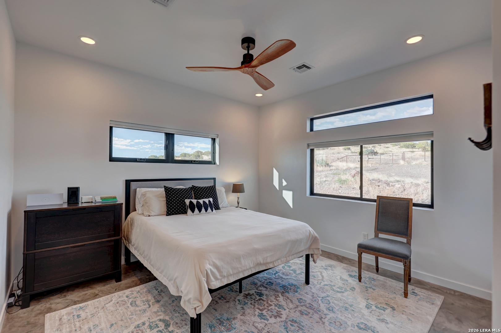 28 Scenic Ridge Road South Alpine, TX 79830 - Photo 21 of 48 a bedroom with a bed and a desk