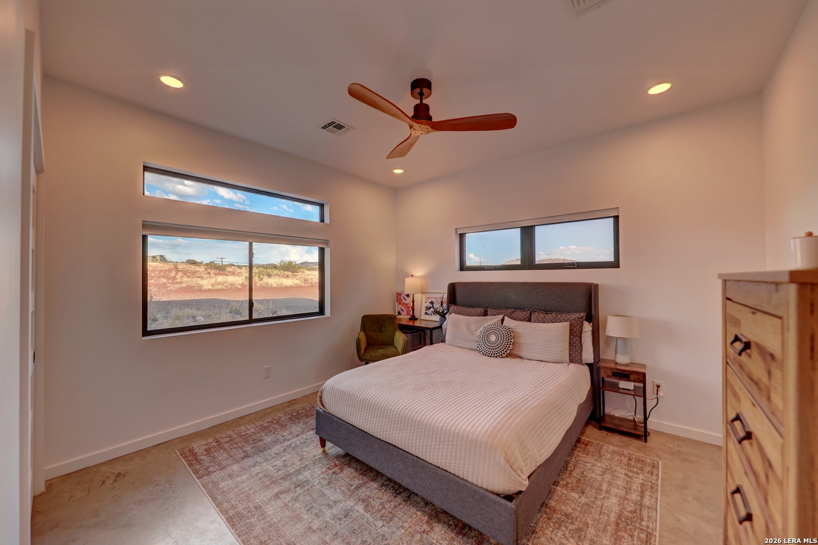 28 Scenic Ridge Road South Alpine, TX 79830 - Photo 25 of 48 a bedroom with a bed and a flat screen tv
