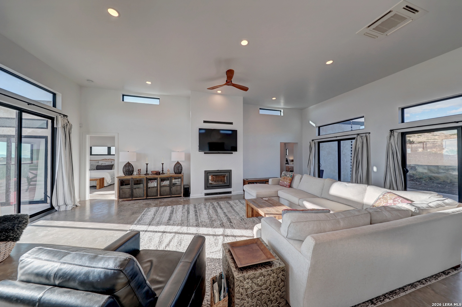 28 Scenic Ridge Road South Alpine, TX 79830 - Photo 28 of 48 a living room with furniture and flat screen tv